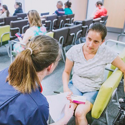 Doctor talking to her patient