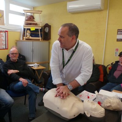 Man giving first aid training