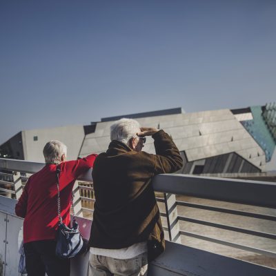 Old couple looking at the deep at a distance