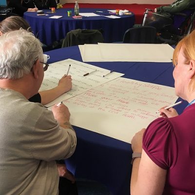 NHS worker with elderly man