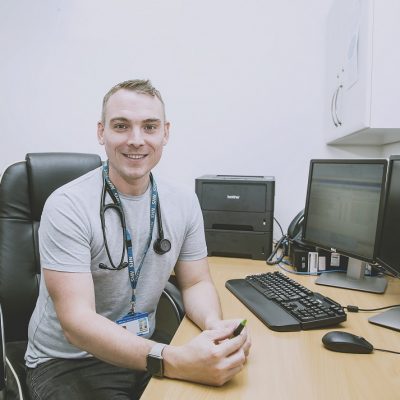 GP at his desk